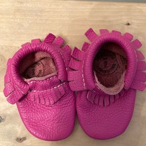 Bright pink freshly picked baby moccasins